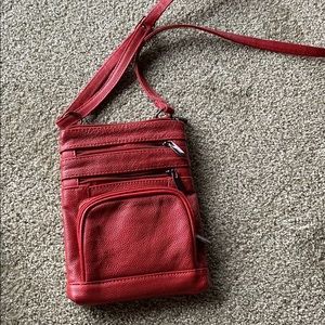 Red crossbody purse.